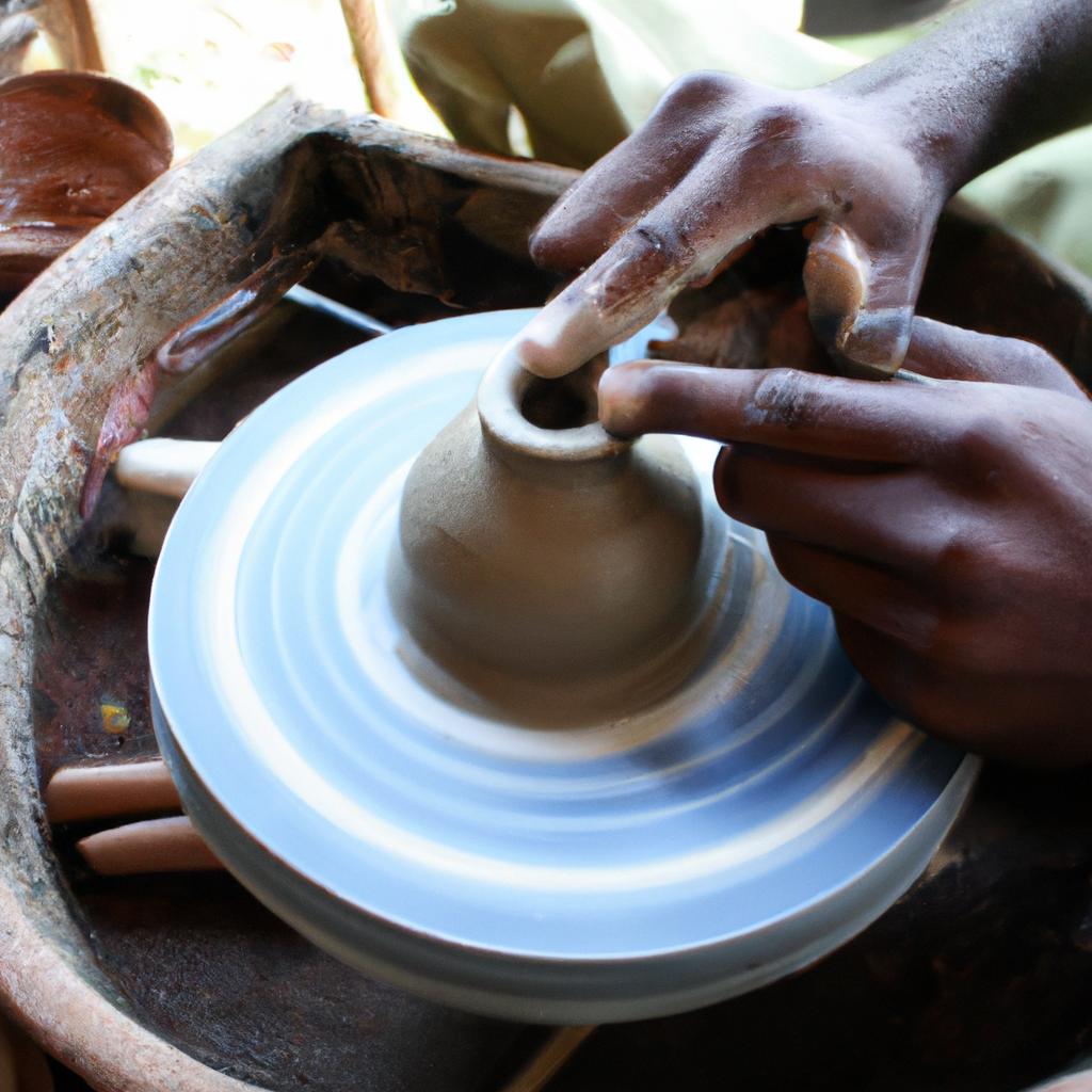Person carving pottery with precision